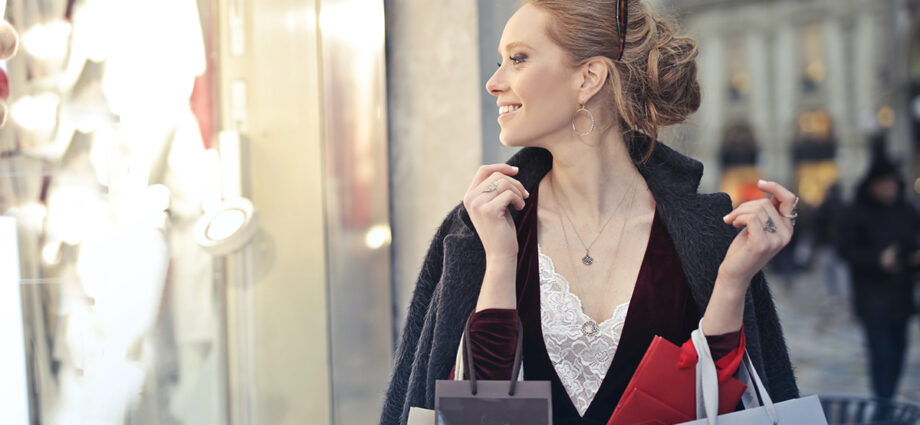 Woman-Wearing-Black-Blazer-Holding-Shopping-Bags